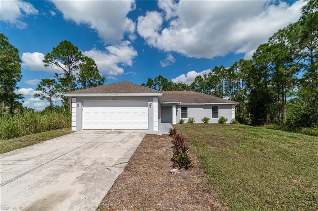 1123 Colonial ST E LEHIGH ACRES, FL 33974