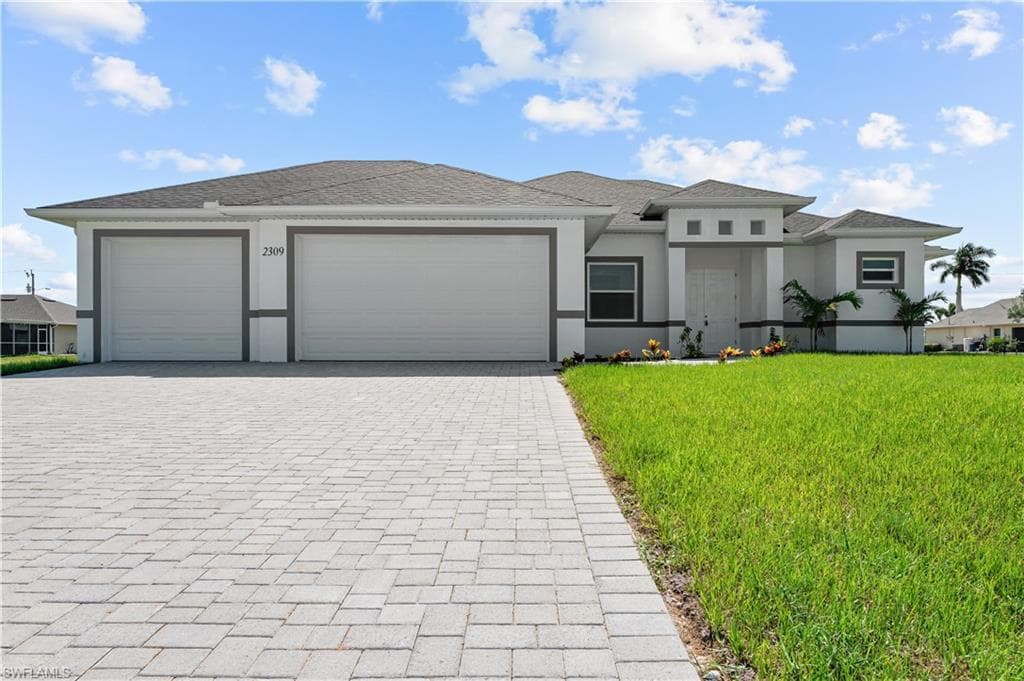 2309 NW 38th PL CAPE CORAL, FL 33993