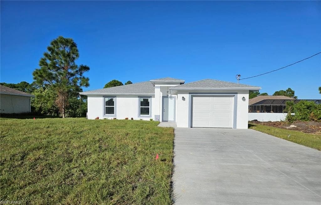309 Petite Ave LEHIGH ACRES, FL 33974