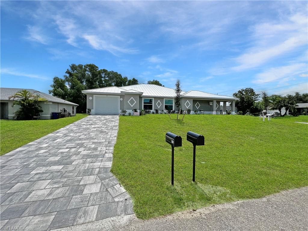 745 Harry AVE S LEHIGH ACRES, FL 33973