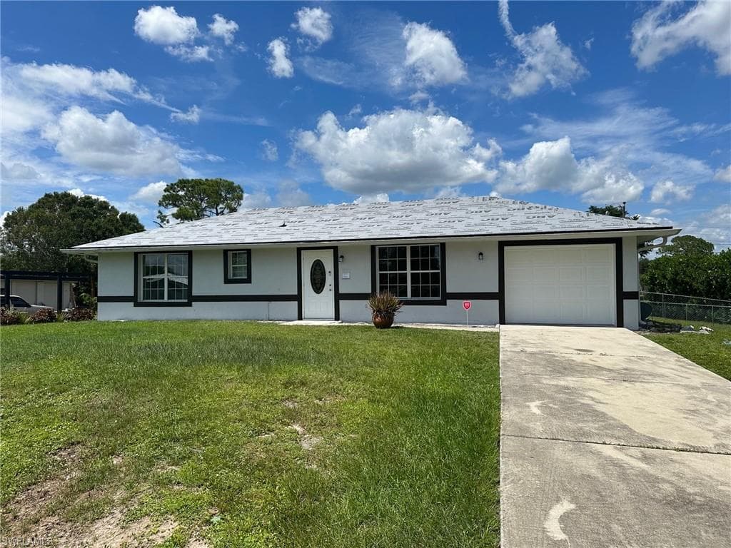 803 Monroe DR LEHIGH ACRES, FL 33936