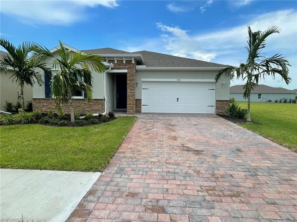 703 Heather Lake AVE CAPE CORAL, FL 33993