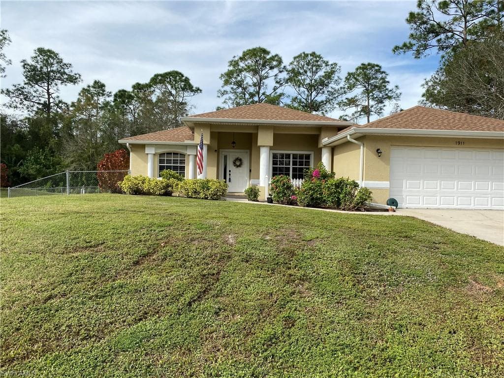 1911 Spartan AVE LEHIGH ACRES, FL 33972