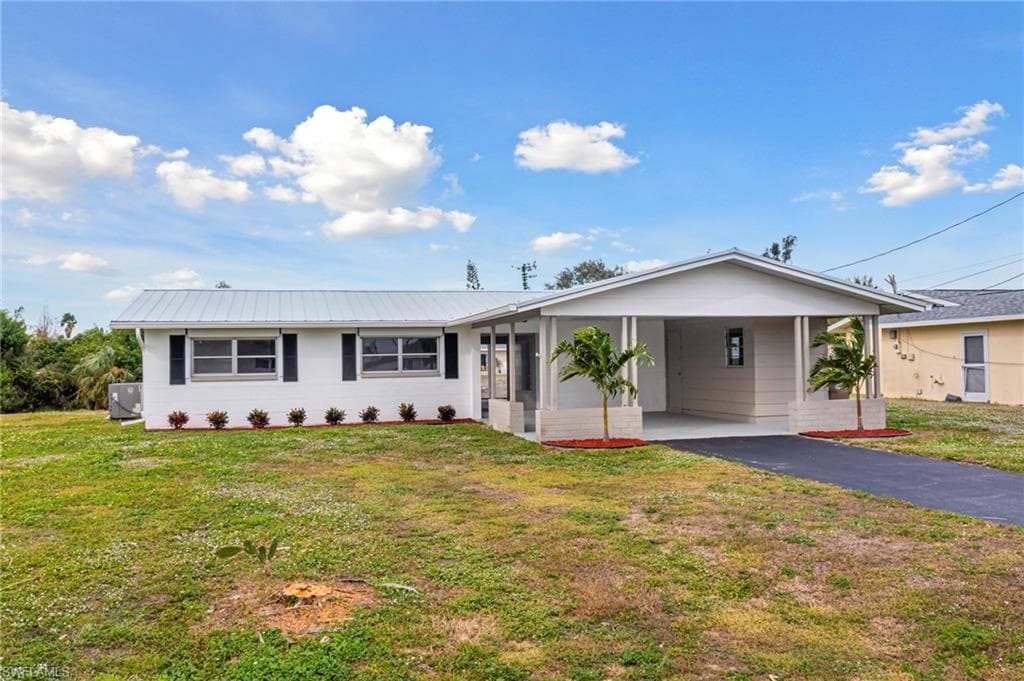 406 NE 14th AVE CAPE CORAL, FL 33909