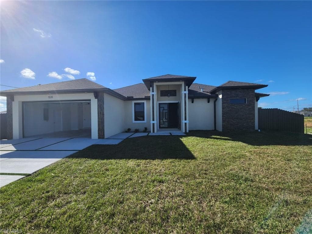 1128 Nelson RD N CAPE CORAL, FL 33993