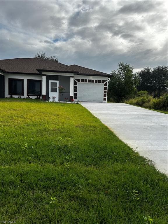 719 Harry AVE S LEHIGH ACRES, FL 33973