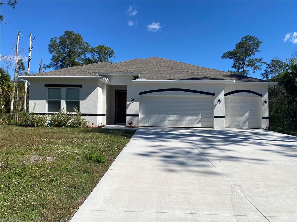 1704 Greenwood AVE LEHIGH ACRES, FL 33972