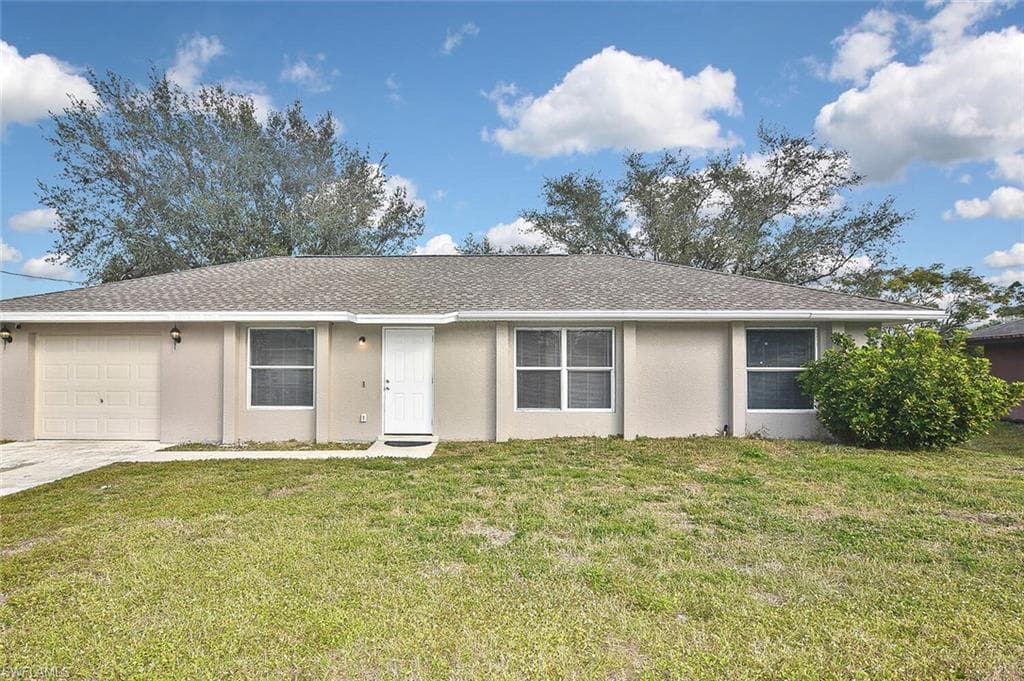 3208 12th ST W LEHIGH ACRES, FL 33971