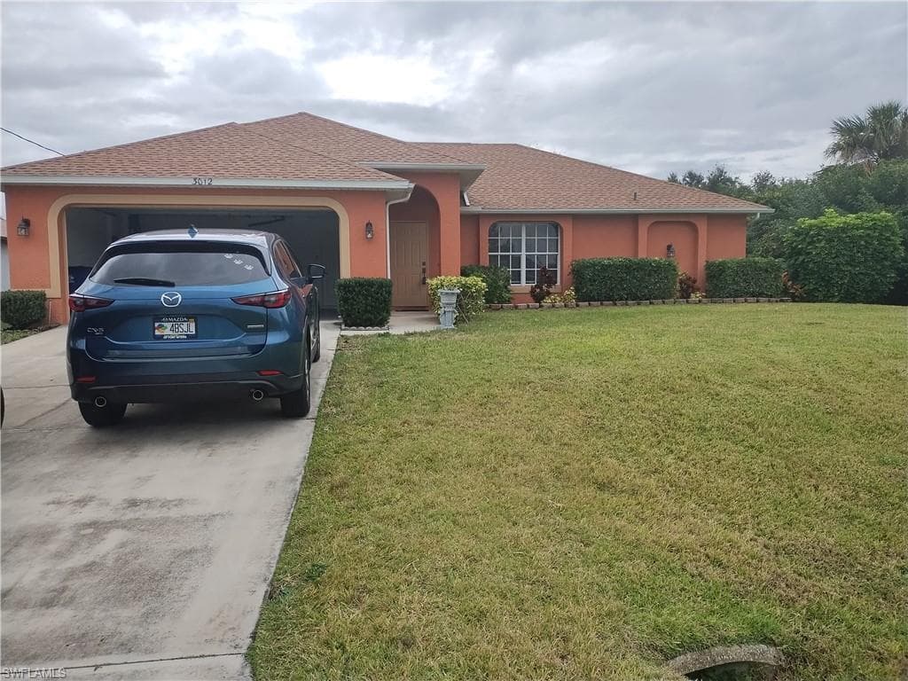 3012 49TH ST SW LEHIGH ACRES, FL 33976
