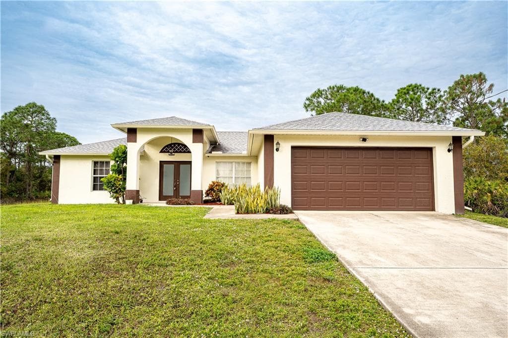 324 Lloyd AVE S LEHIGH ACRES, FL 33974