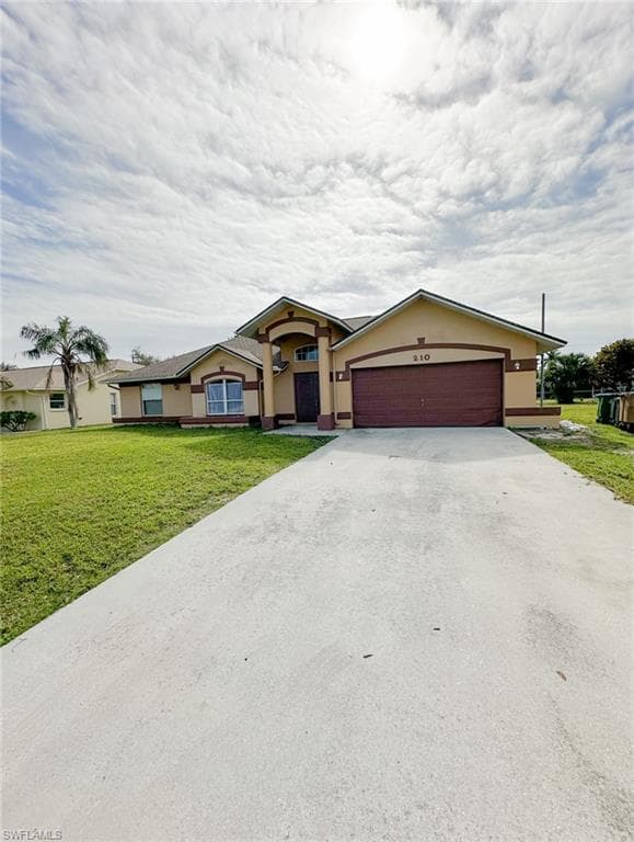 210 SE 23rd TER CAPE CORAL, FL 33990