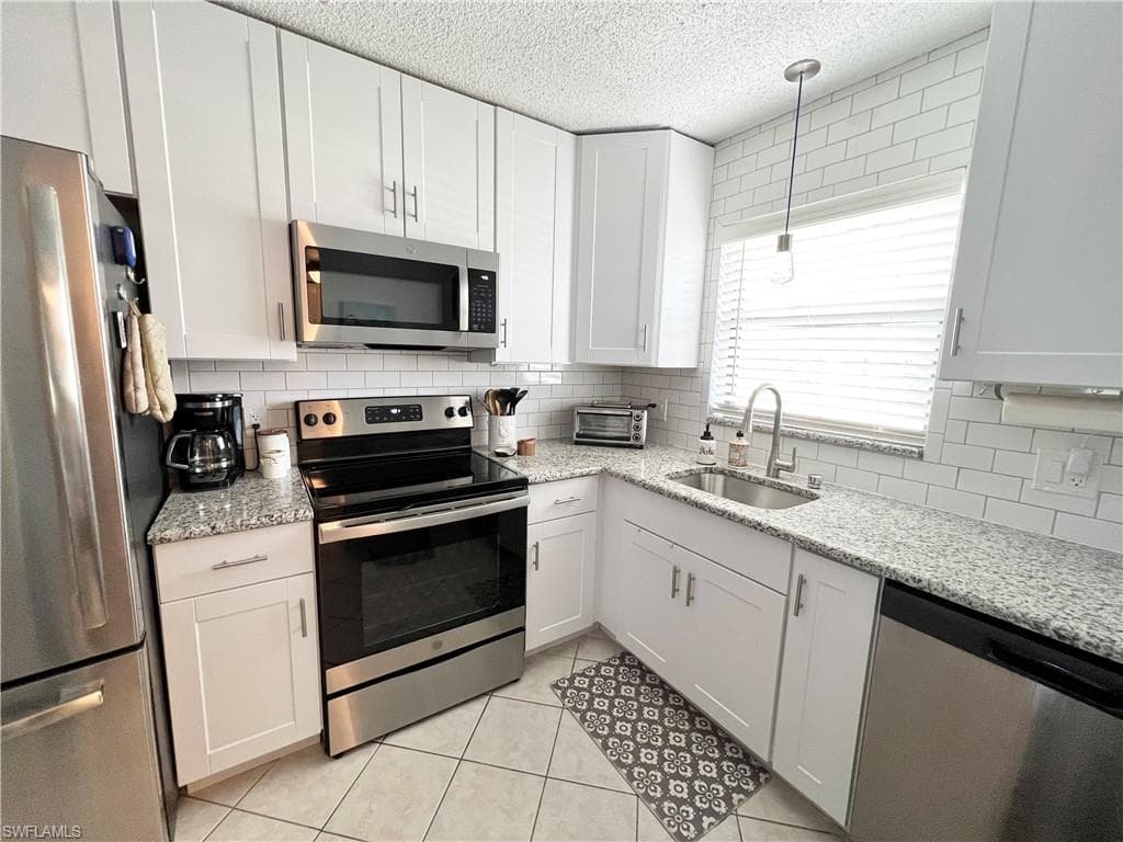 4338 27th CT SW 8-201 NAPLES, FL 34116