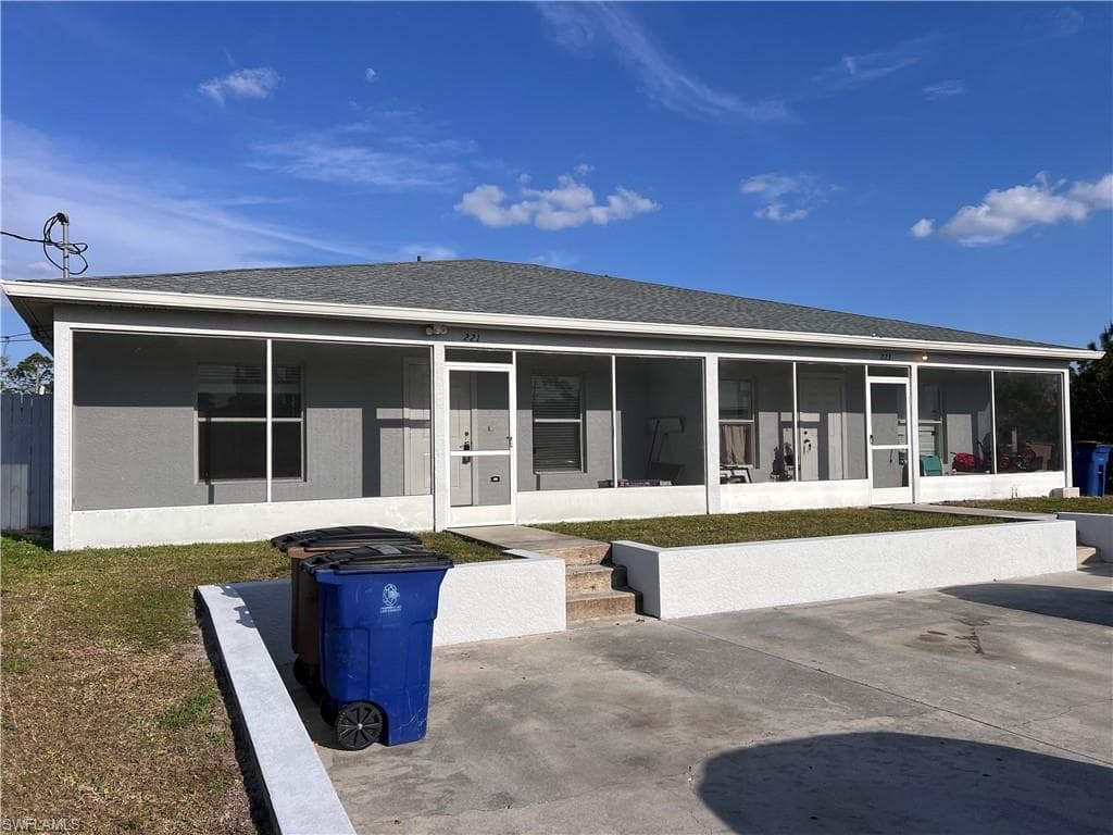 221-223 Ivan AVE S LEHIGH ACRES, FL 33973