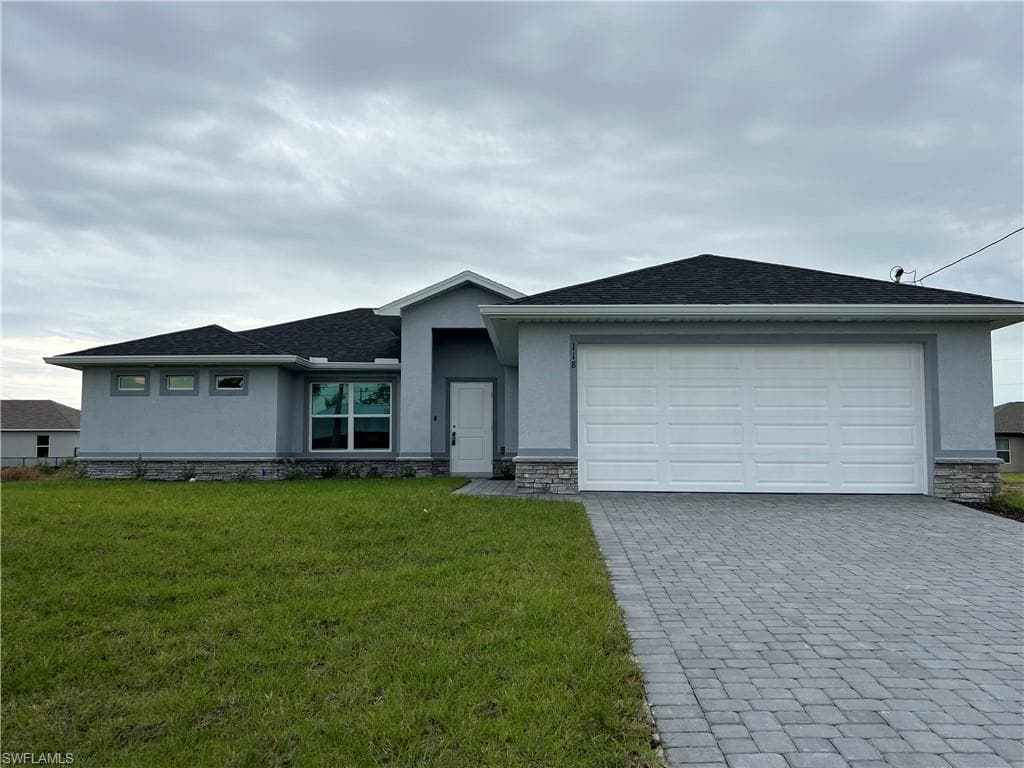 118 NW 25th TER CAPE CORAL, FL 33993