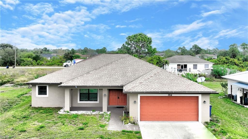 2614 11th ST SW LEHIGH ACRES, FL 33976