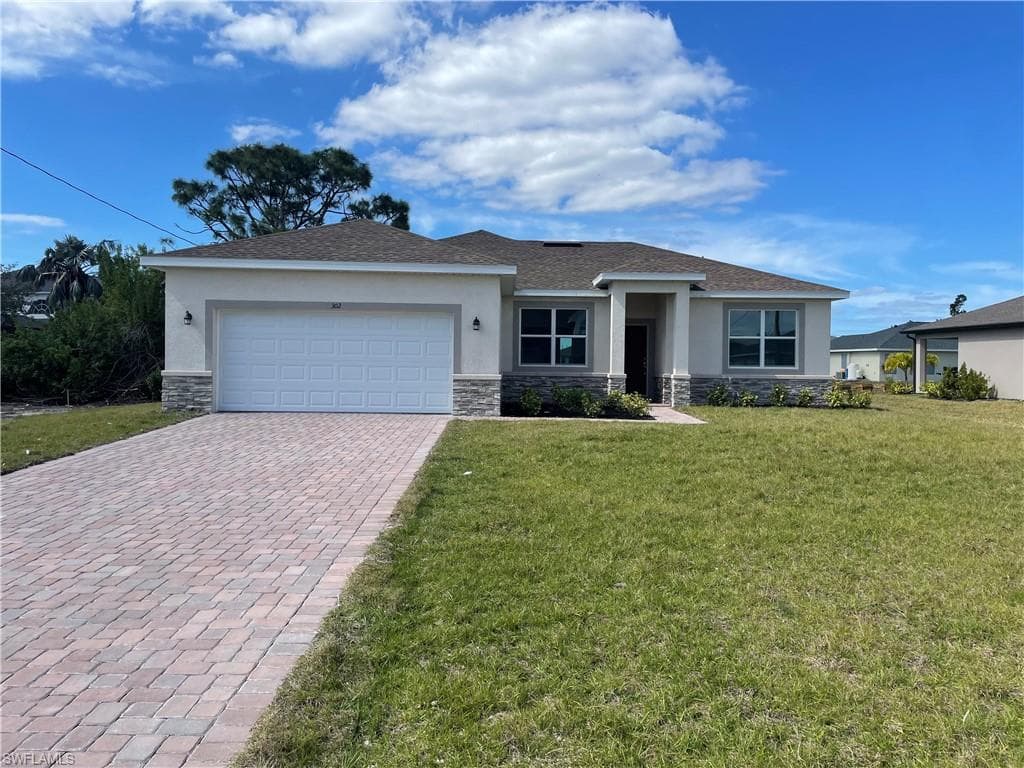 302 SW 25th PL CAPE CORAL, FL 33991