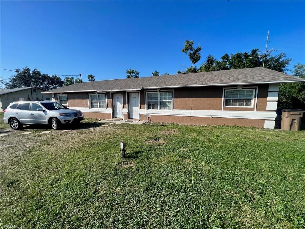 1104-1106 Harry AVE S LEHIGH ACRES, FL 33973