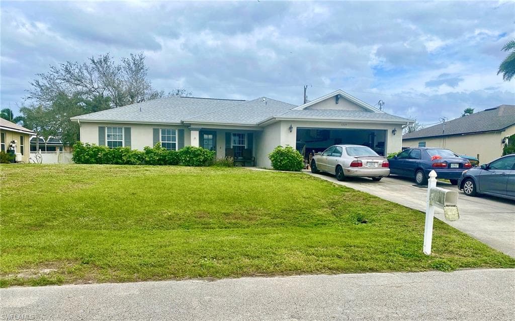 1329 NW 9th AVE CAPE CORAL, FL 33993