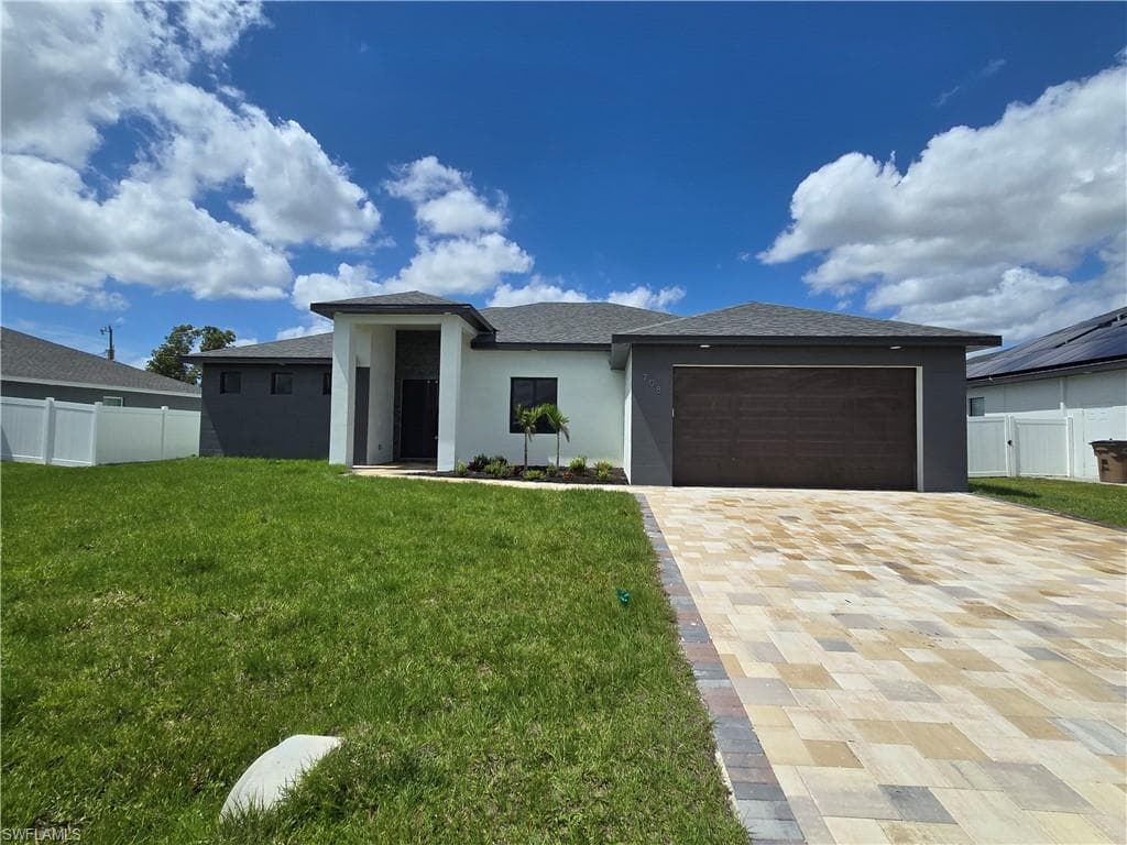 708 NE Juanita CT CAPE CORAL, FL 33909