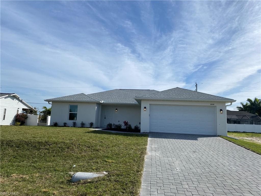 2209 NE 13th PL CAPE CORAL, FL 33909