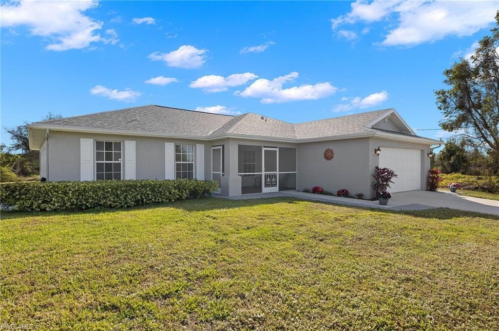 5902 Olive AVE N LEHIGH ACRES, FL 33971