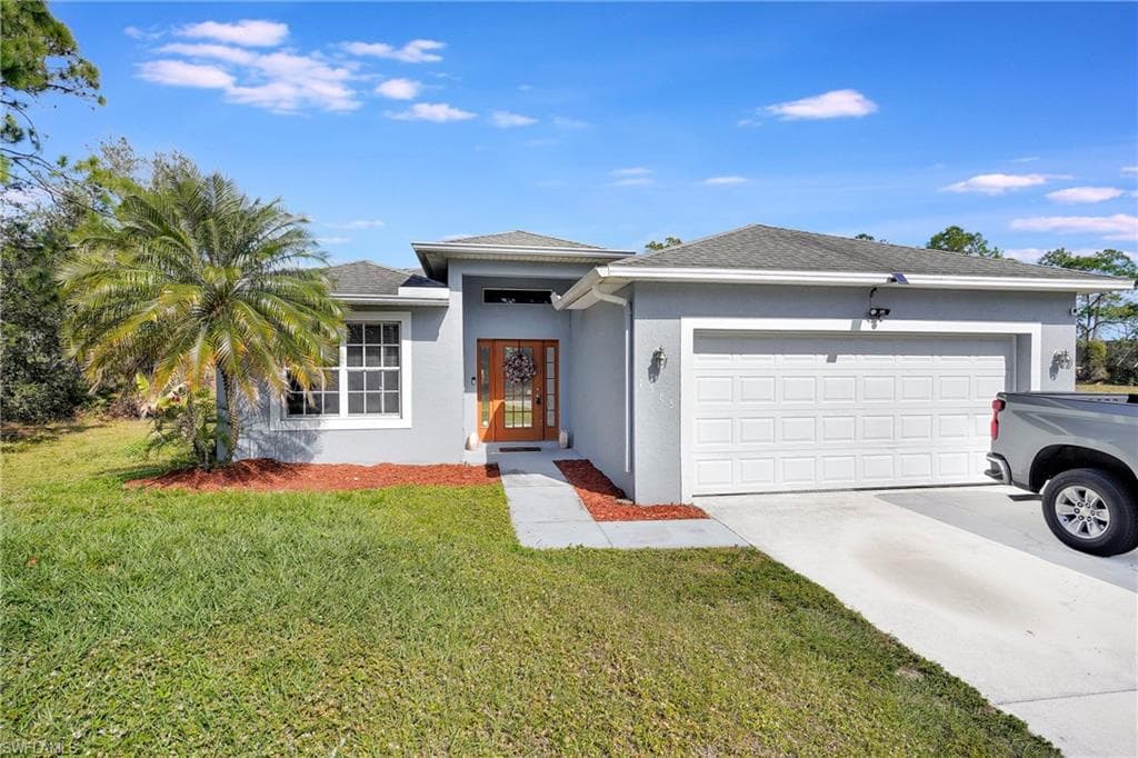 1565 Meadow RD LEHIGH ACRES, FL 33976