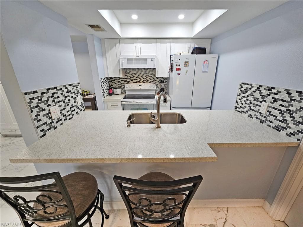 4339 27th CT SW 7-104 NAPLES, FL 34116