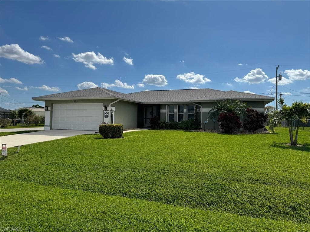 1122 SE 32nd TER CAPE CORAL, FL 33904