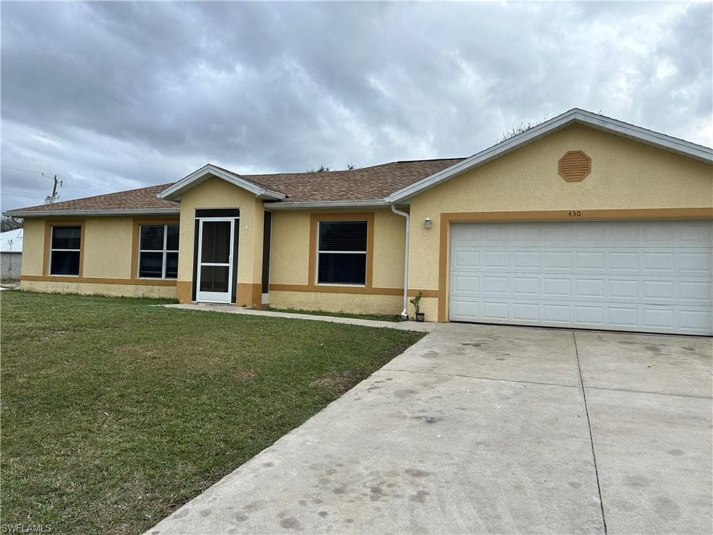 450 Rathburn ST LEHIGH ACRES, FL 33974