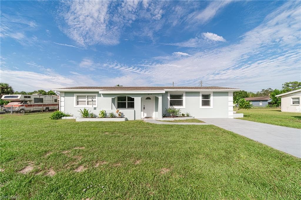 813 Joel BLVD LEHIGH ACRES, FL 33936