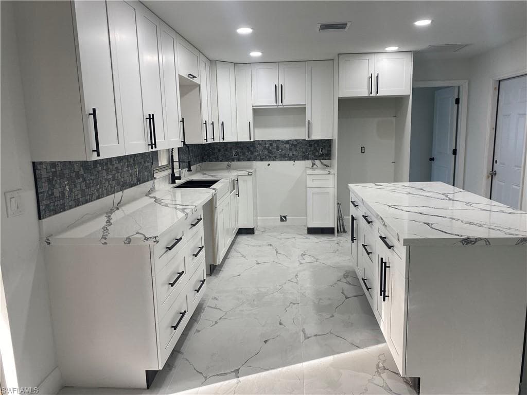 218 Maple AVE S LEHIGH ACRES, FL 33936