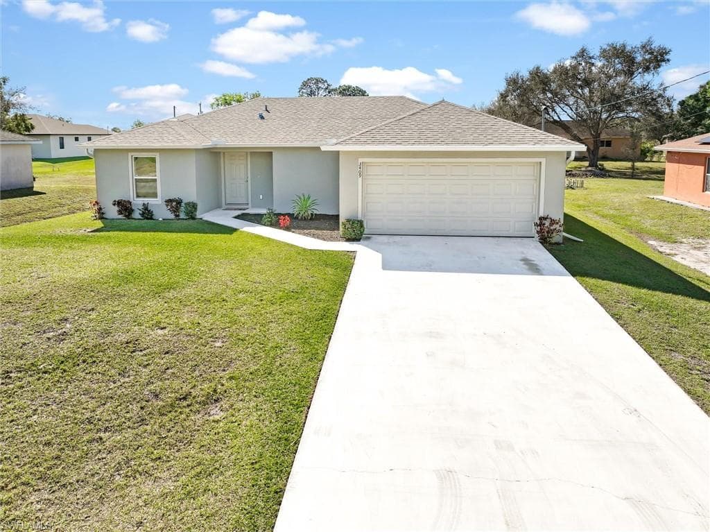 3409 25th ST SW LEHIGH ACRES, FL 33976
