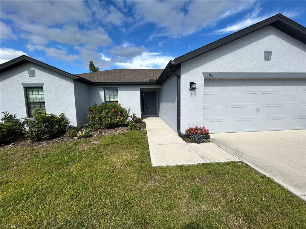 703 SW 21st TER CAPE CORAL, FL 33991