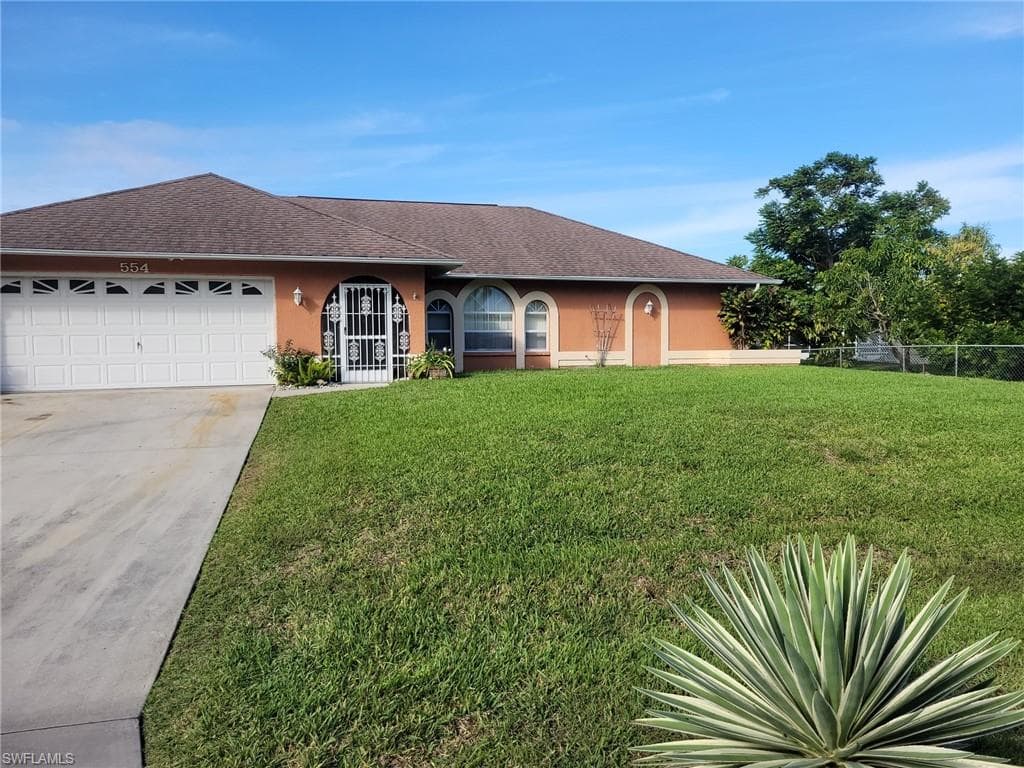 554 Empire AVE S LEHIGH ACRES, FL 33974