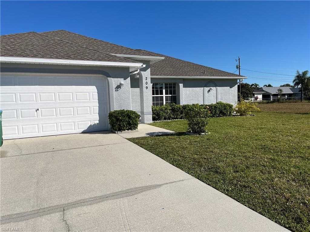 209 SE 19th LN CAPE CORAL, FL 33990