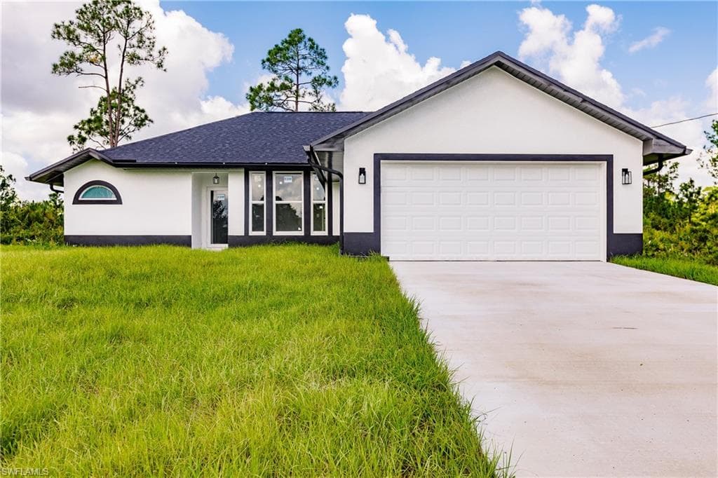 816 Maple AVE N LEHIGH ACRES, FL 33972