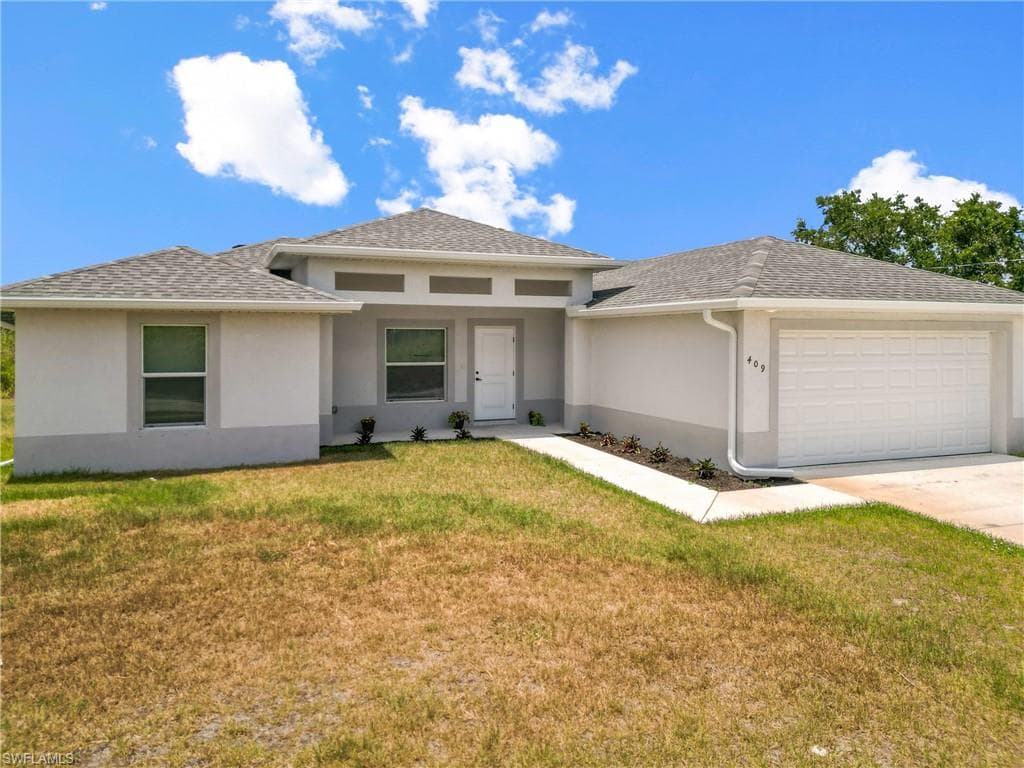 409 Moore AVE LEHIGH ACRES, FL 33972