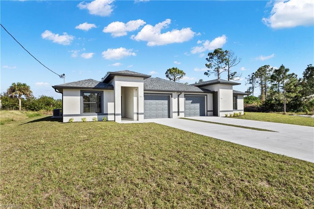 377/379 Carrillon AVE S LEHIGH ACRES, FL 33974