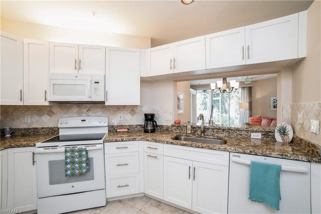1101 Sweetwater LN 1104 NAPLES, FL 34110