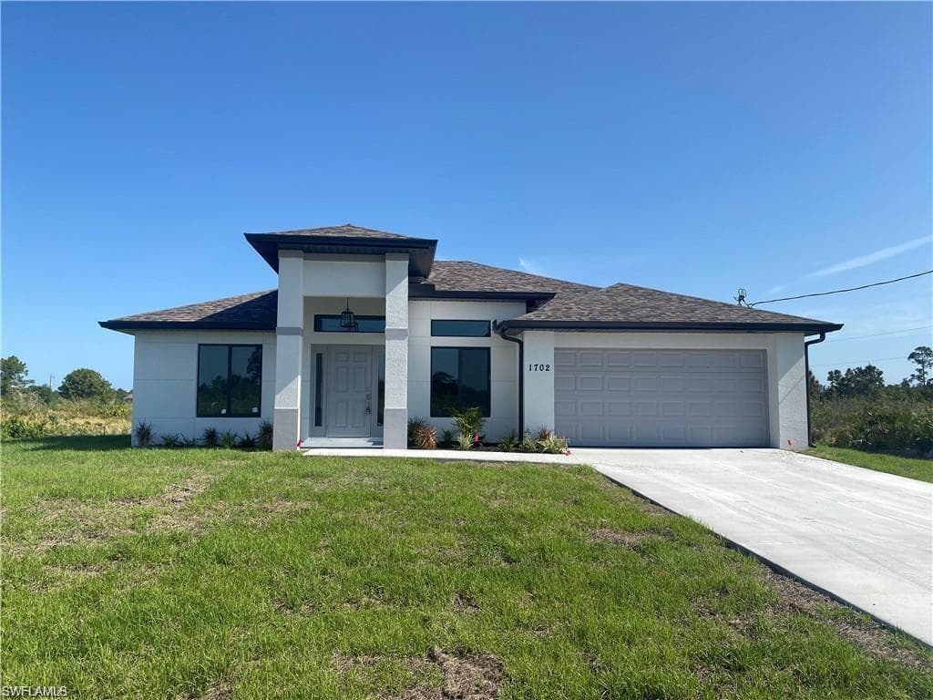 1702 W 13th ST LEHIGH ACRES, FL 33972