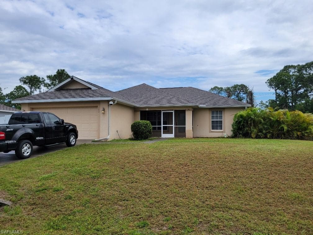 103 E 11th St LEHIGH ACRES, FL 33972
