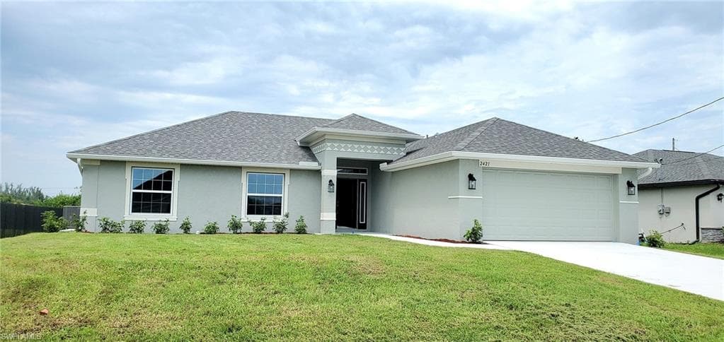 2421 NW 9th ST CAPE CORAL, FL 33993
