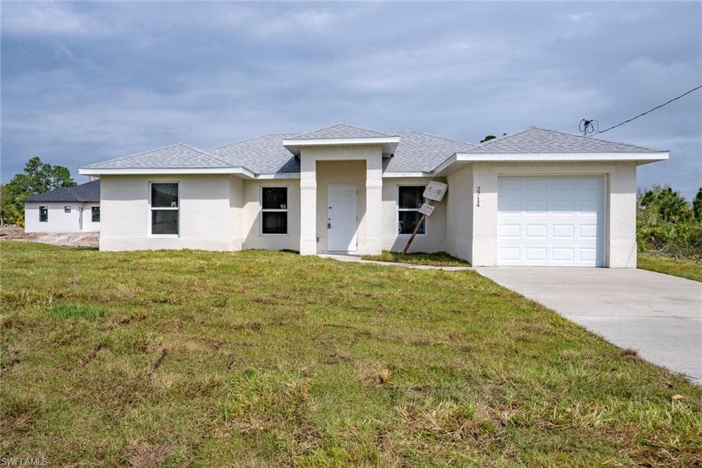2714 10th ST SW LEHIGH ACRES, FL 33976