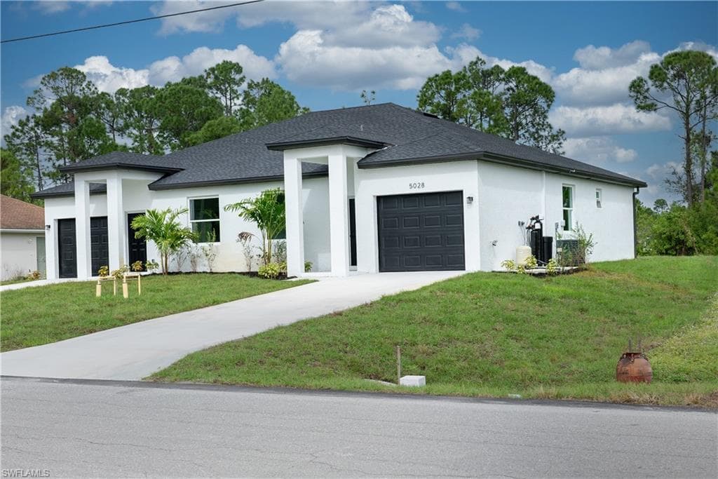 1125-1127 Ivan AVE S LEHIGH ACRES, FL 33973