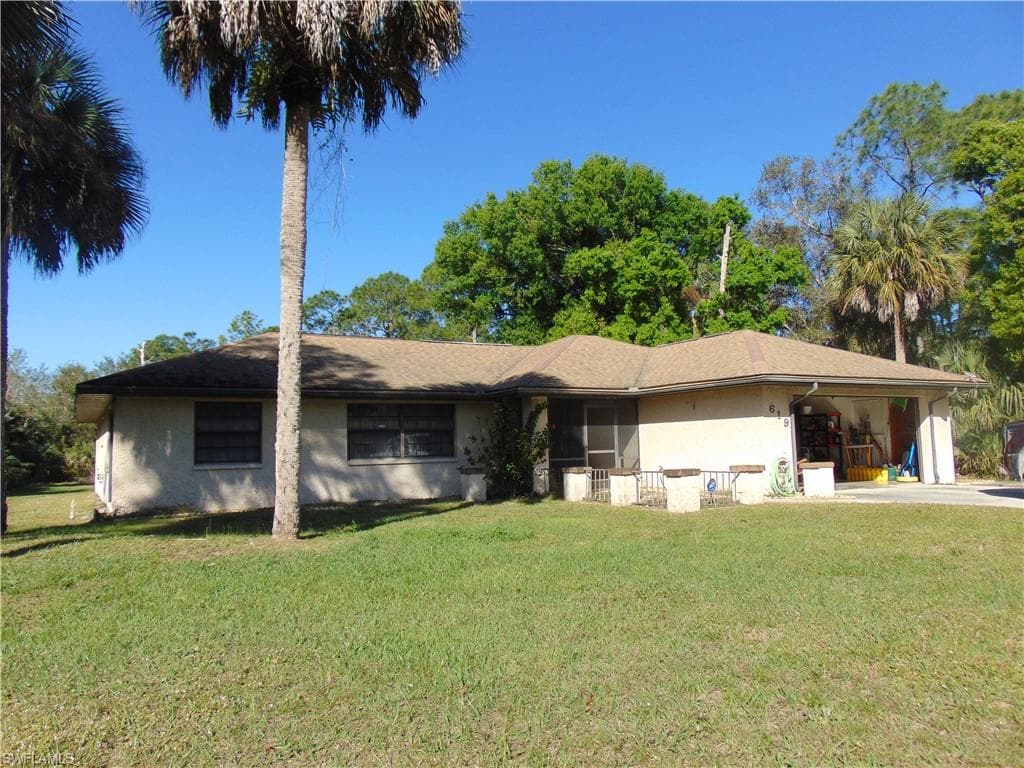 619 Calvin AVE LEHIGH ACRES, FL 33972
