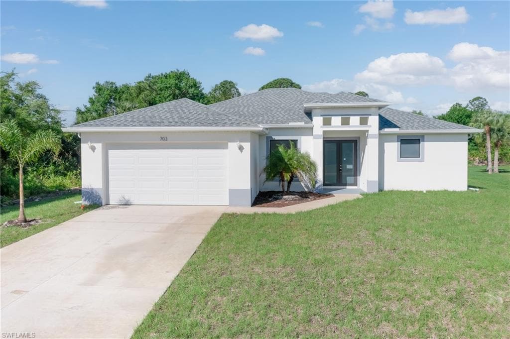 703 Washington AVE LEHIGH ACRES, FL 33972