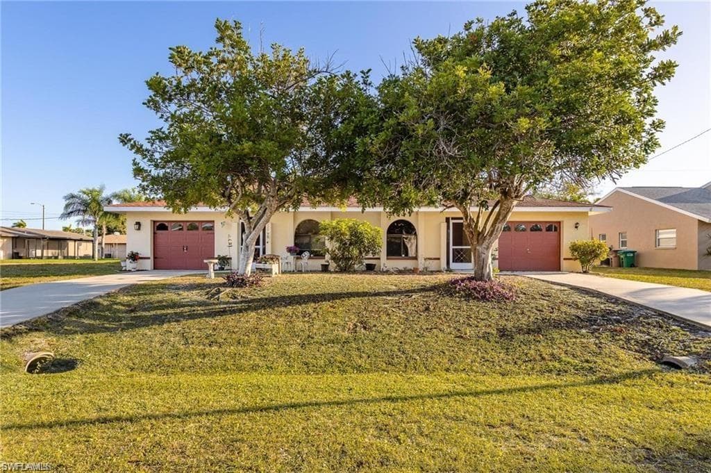 718-720 SE 46th TER CAPE CORAL, FL 33904
