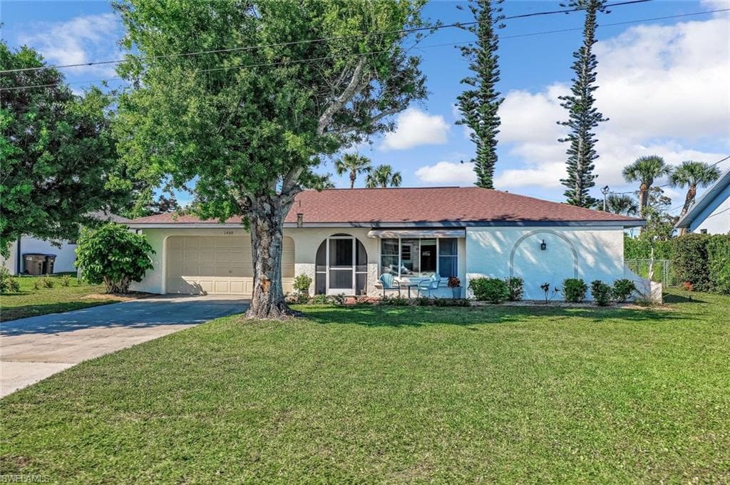 1409 SW 18th ST CAPE CORAL, FL 33991