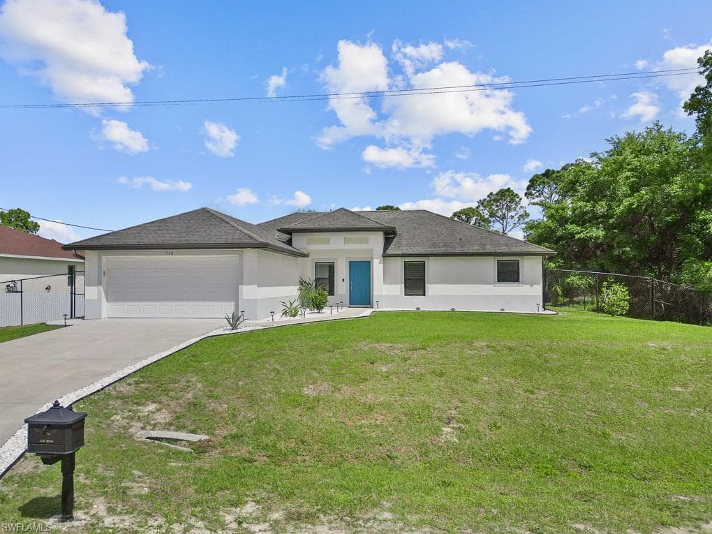 718 Plumosa AVE LEHIGH ACRES, FL 33972