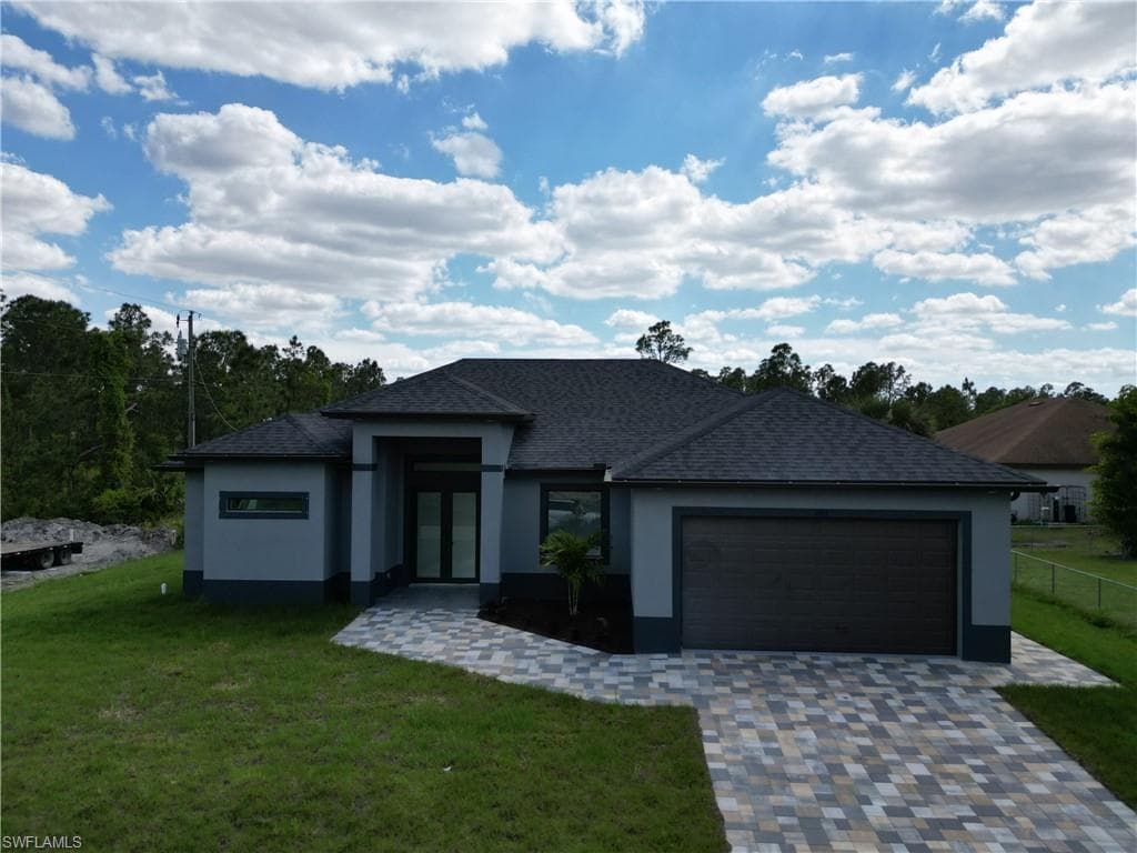908 Sara AVE N LEHIGH ACRES, FL 33971